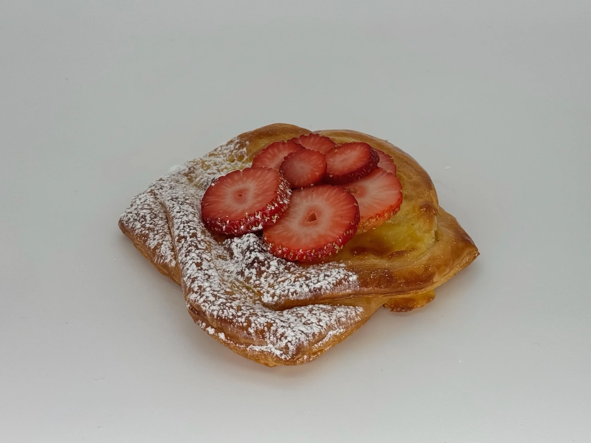 Baked Custard and fresh Strawberry Danish - Creamy vanilla custard layered with fresh, juicy strawberries over golden, flaky pastry. Light, luscious, and beautifully vibrant.