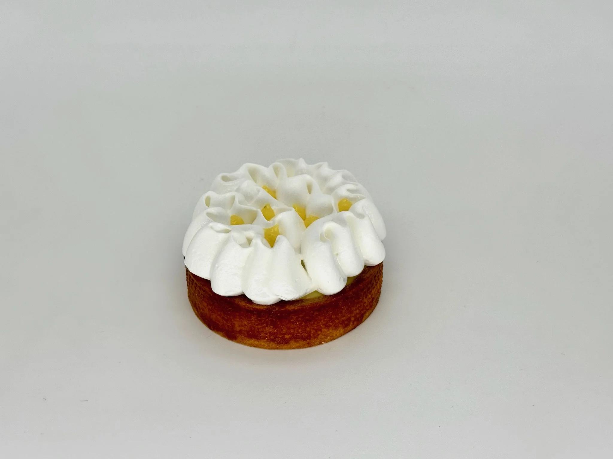 Lime Almond Meringue Tartlet - Zesty lime curd layered over soft almond cream, topped with silky Italian meringue.