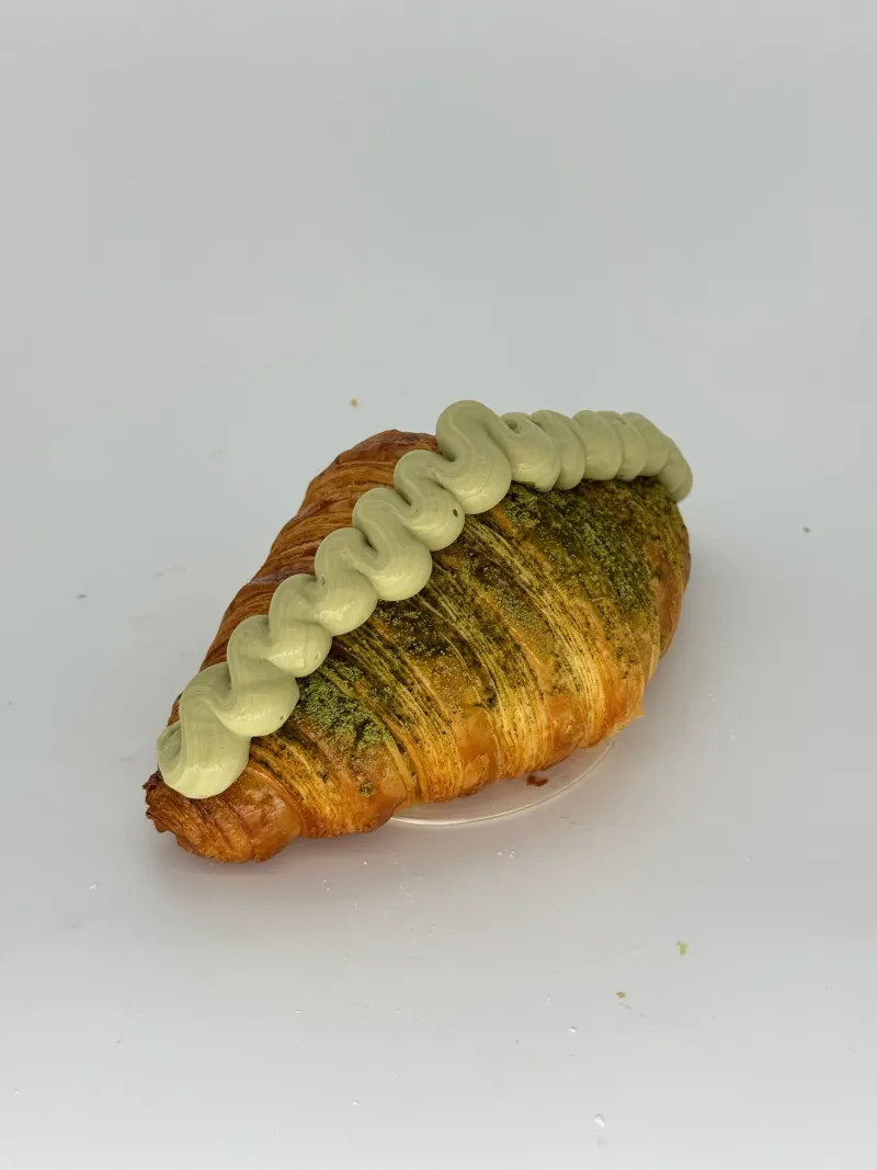 Matcha Cream Croissant - Flaky, buttery layers filled with silky matcha custard cream. Smooth. Addictive for all matcha lovers.